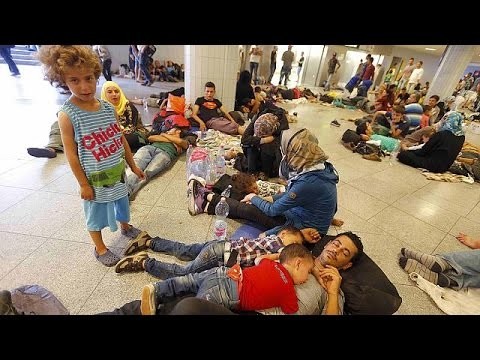 Stuck in Budapest: migrants bed down for second night outside railway station